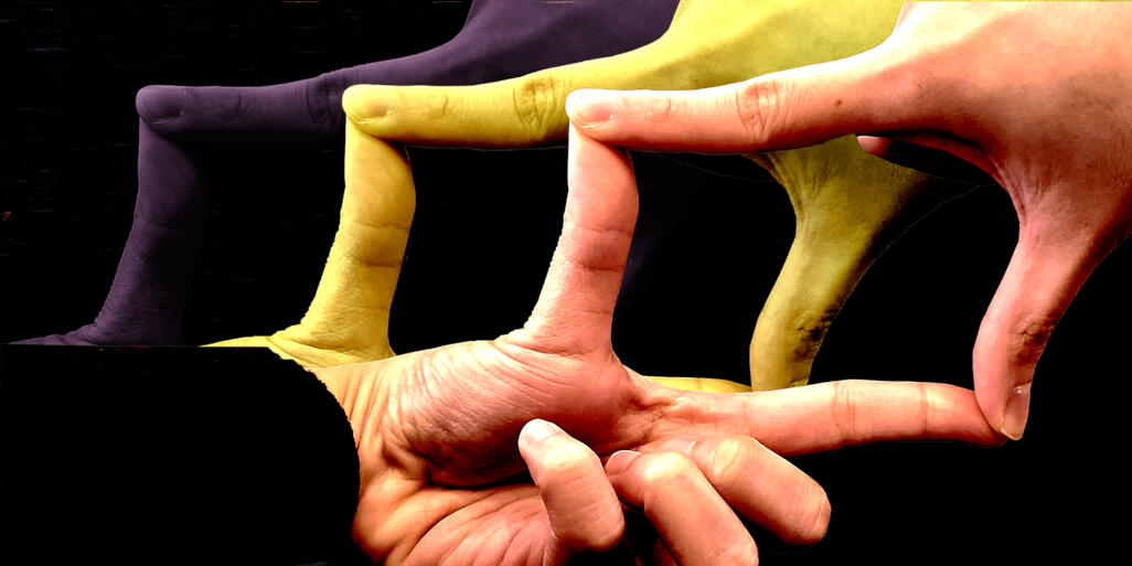 Hands in red, yellow, and blue make a picture frame using their fingers.